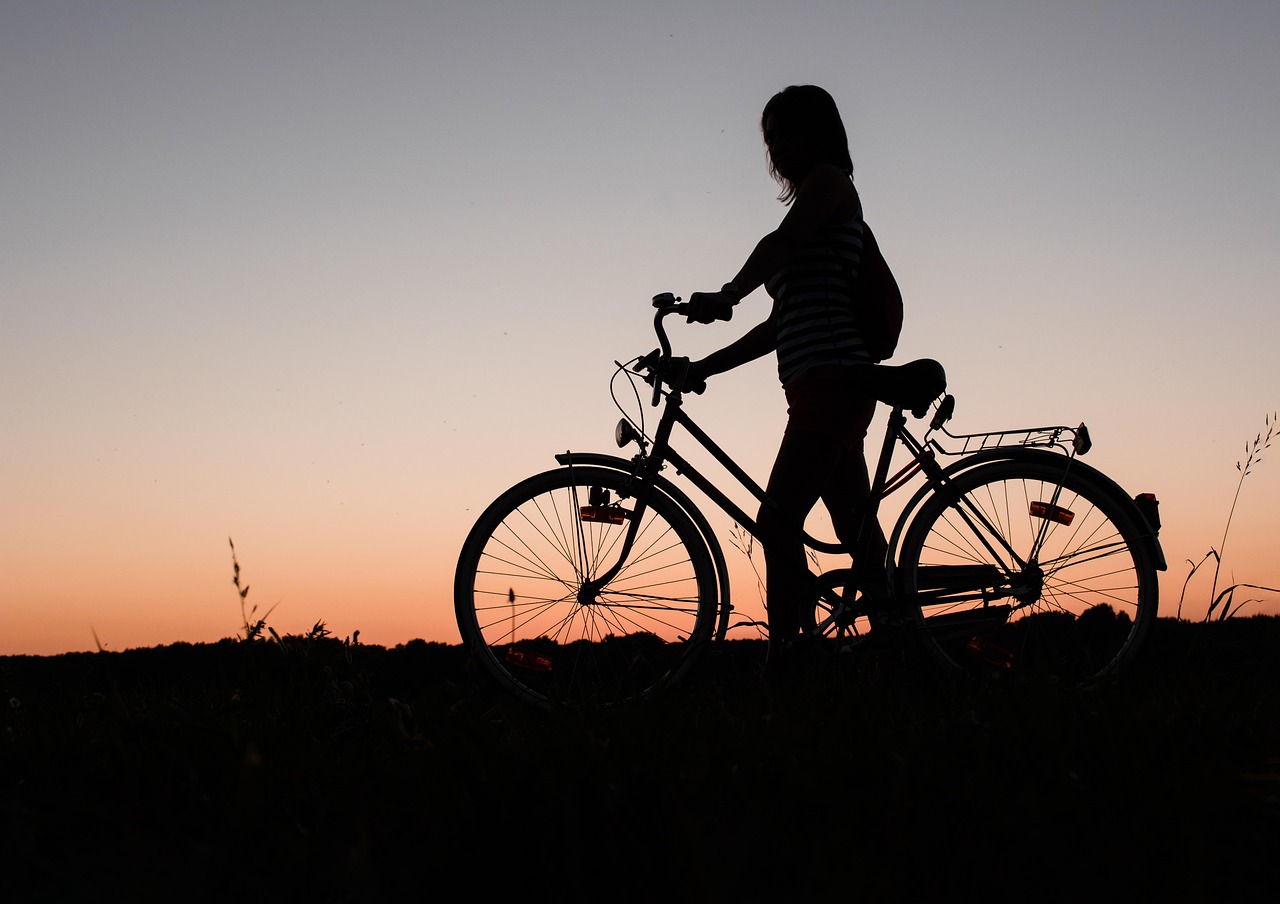 girl on 1980s bike